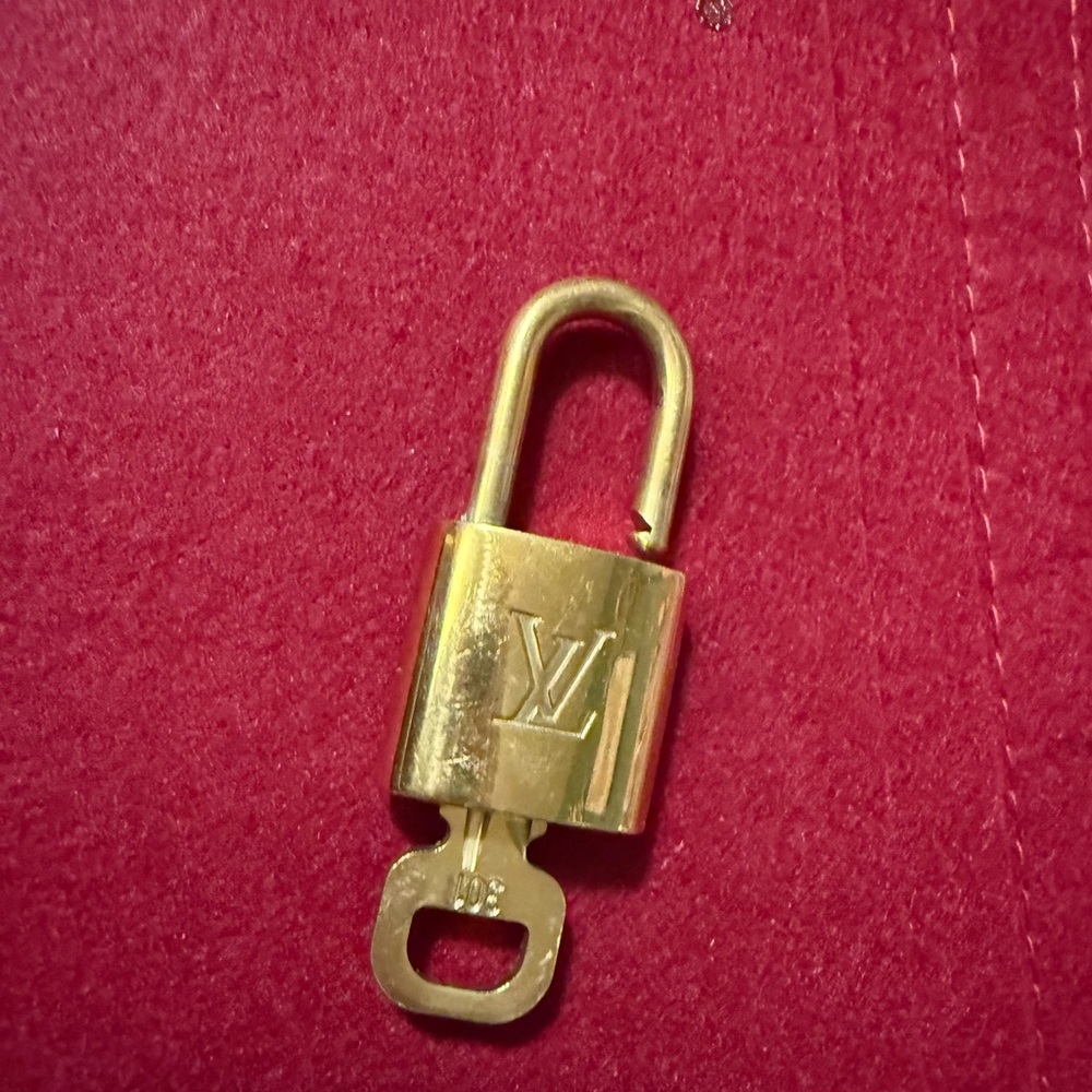 Authentic Louis Vuitton Gold Padlock
